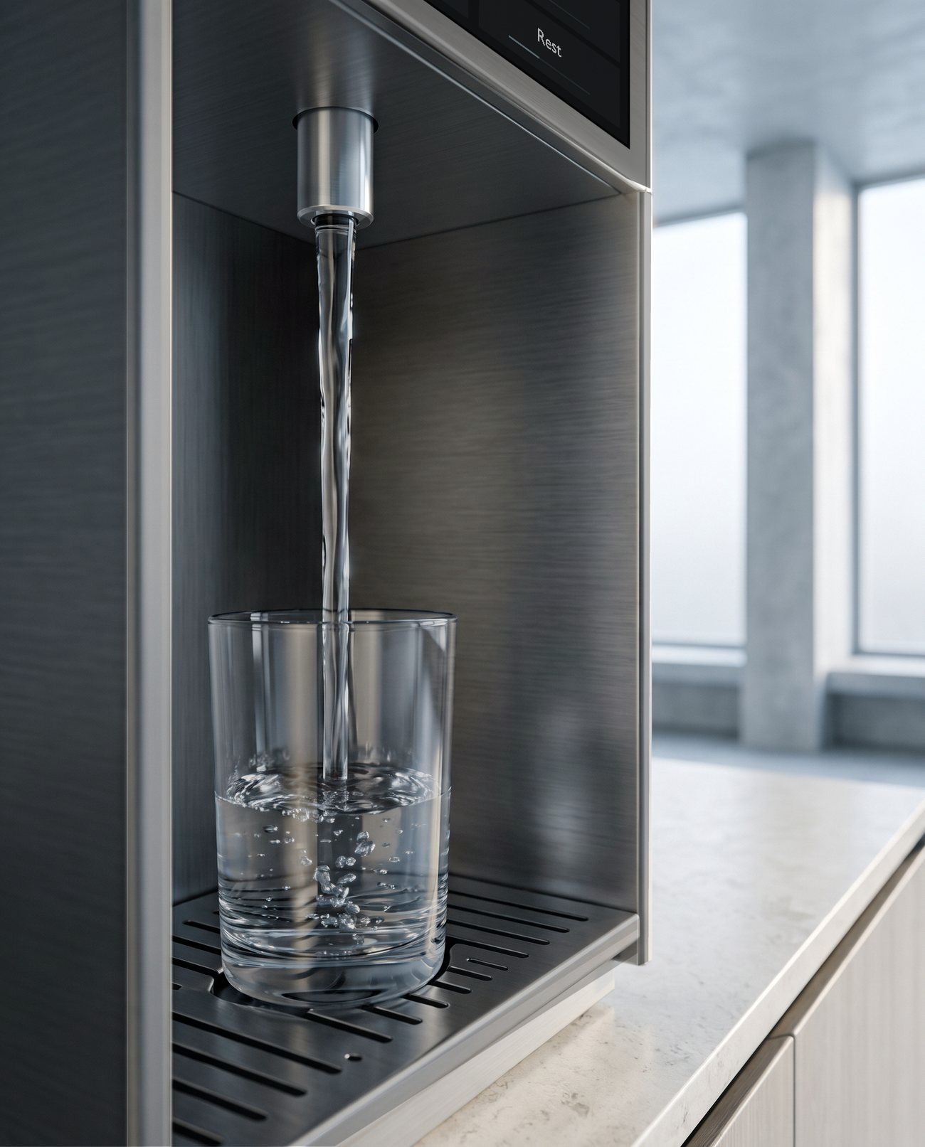 Clear water pouring into a glass